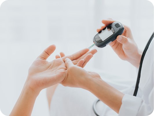 Misurazione glicemia con goccia di sangue